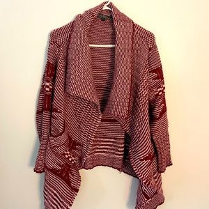 Open sweater cardigan. Red and white pattern. Size small.